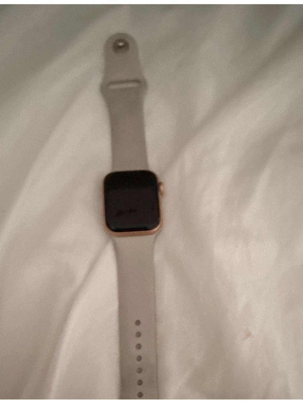 Smartwatch with Light Gray Silicone Band and Rose Gold Case